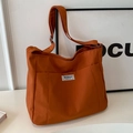 Bolso tote de lona color caramelo con correa ajustable y etiqueta de logotipo tejida - Naranja