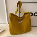 Ginger yellow canvas tote bag with adjustable shoulder strap and multiple utility pockets - Yellow