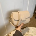 Beige lychee pattern leather crossbody saddle bag with golden buckle and strap - Beige