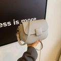 Grey litchi leather crossbody bag with gold buckle and adjustable shoulder strap - Gray