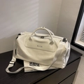 Large white glossy PU leather travel bag with shoulder strap and Noco BAG logo - White