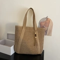 Handwoven straw tote bag in light brown with wooden bead tassel charm for summer beach - Khaki