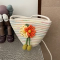White woven bucket bag with colorful wavy stitching and 3D floral accents for summer - White