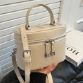 Mini borsa a secchiello in pelle beige con dettagli argento e tracolla regolabile - Bianco Sporco