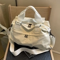 Borsa tote in nylon bianco minimalista con manici larghi e dettagli neri - Bianco Sporco