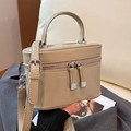 Mini borsa a secchiello beige con cerniere argentate e tracolla regolabile rimovibile - Albicocca