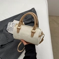 White cylinder Boston bag with beige leather handles and gold-toned metal accents - White Khaki Without Pendant