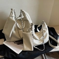 Beige tote bag set with metal chain detail and matching pouch on dark background - Rice White Large