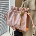 Pink quilted leather bucket bag with gold chain strap and drawstring closure - Pink