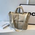 Quilted beige puffer tote bag with padded handles and adjustable wide crossbody strap - Off-white