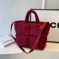 Quilted down tote bag in dark red color with wide woven strap for shoulder carry - Burgundy