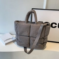 Dark grey quilted tote bag with large square stitching and adjustable shoulder strap - Gray