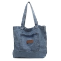 Classic blue washed denim tote bag with leather patch logo and front pocket - Light Blue