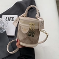 Quilted beige bucket bag with brown leather trim and silk scarf wrapped on handle - Off-white Without Pendant