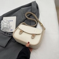 Elegant cream saddle bag with khaki trim and adjustable strap on a grey blazer - Off-white Without Pendant