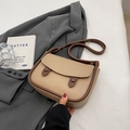 Retro beige and brown saddle bag with adjustable strap on a grey suit jacket - Khaki No Pendant