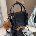 Black faux crocodile leather crossbody bag with a cute bear pendant and top handle - Black