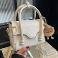 Chic off-white crocodile embossed small square bag with a round handle and bear charm - Off-white
