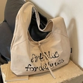 Borsa tote in tela kaki con stampa di scritte nere e coulisse di grandi dimensioni - Cachi Chiaro