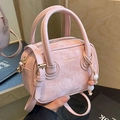 Borsa a tracolla rosa in pelle PU con trama vintage e manici circolari da donna - Rosa