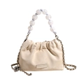 Creamy white pleated bucket bag with pearl handle and gold chain shoulder strap - White