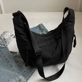 Versatile black crescent nylon crossbody bag with wide adjustable strap for daily use - Black
