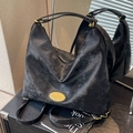 Versatile black faux leather tote backpack with gold logo plate and convertible straps - Black