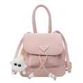 Chic pink mini backpack in matte finish with triangle logo and plush charm accessory - With Pendant / Pink