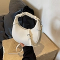 Chic off-white dumpling bag in pebble leather with a stylish pleated handle - White