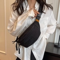 Minimalist black nylon crossbody chest bag with orange woven label and zipper detail - Black