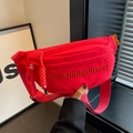 Red canvas waist bag featuring tone-on-tone embroidery and orange brand tag detailing - Red