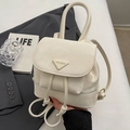 Chic beige mini drawstring backpack with metallic triangle logo and top handle - Off-white Without Pendant