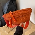 Vibrant orange canvas waist bag with embroidered lettering and adjustable strap - Orange