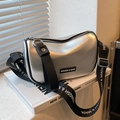 Silver metallic cylinder crossbody bag with branded wide black fabric shoulder strap - Silver