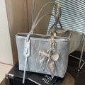 Silver metallic tote bag with wrinkled texture and fashion bow scarf accessory - Silver