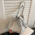 Silver-grey pleated bucket bag with metallic finish and slim shoulder strap - Silver