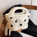 Cream polka dot bucket bag with transparent PVC layer and integrated handle - White