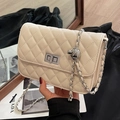 Beige quilted chain crossbody bag with silver metal ball adjuster and twist lock - Off-white