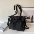 Borsa tote in tela nera con coulisse, design a pieghe e tracolla regolabile - Nero