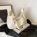 Creamy white oversized faux leather shoulder bag with a cute plush bear charm - White