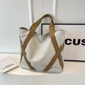 Large beige canvas tote bag with brown contrast straps for daily commute or school - Off White