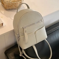 Mini zaino in pelle martellata grigio chiaro con cerniere argentate e spalline fini - Grigio