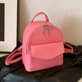 Pink pleated ballet-style backpack in pebble faux leather with silver metal hardware - Pink