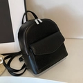 Minimalist black lychee texture backpack with silver zippers and front flap pocket - Black