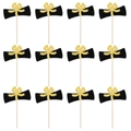 Set of 12 black scroll graduation cupcake toppers with gold glitter bows on white background - 12-Piece Set (Scroll & Cap Style)