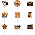Set di 9 decorazioni per cupcake di laurea in arancione e nero con cappelli - Arancione