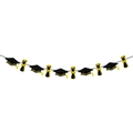 Glittery graduation banner with black doctoral caps and golden scrolls on white backdrop - Graduation Cap & Scroll Style