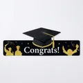 Black and gold graduation party banner with Congrats text and glitter mortarboard cap - Congrats Letter Style (J-0191-3)