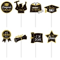 8-piece black and gold graduation photo booth props with glitter finish and bachelor caps - Gold Glitter Style (Y-00223-4)