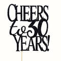 Macro shot of black glitter 30th anniversary cake topper with Cheers to 30 Years text - 30 Years / Black